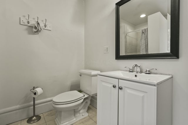 bathroom with tile patterned flooring, vanity, toilet, and a shower with shower curtain