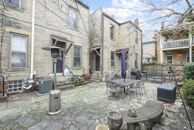 view of patio / terrace with grilling area and central air condition unit