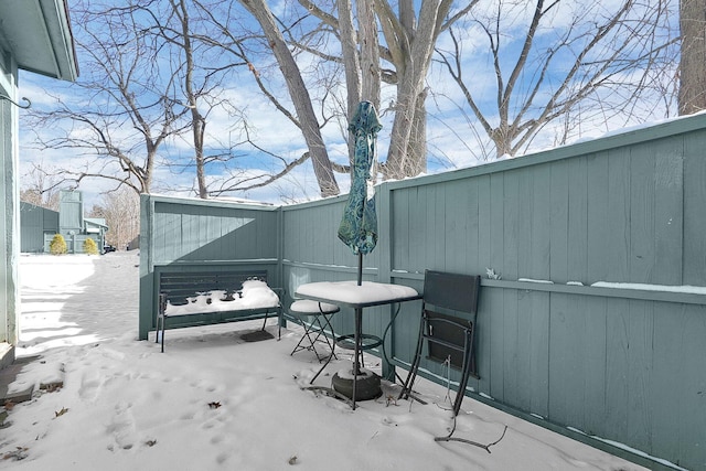 view of snow covered patio