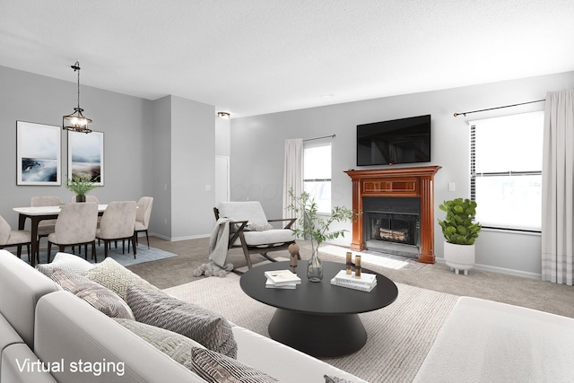 living room with a textured ceiling and light colored carpet