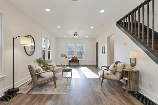 living area featuring dark hardwood / wood-style flooring