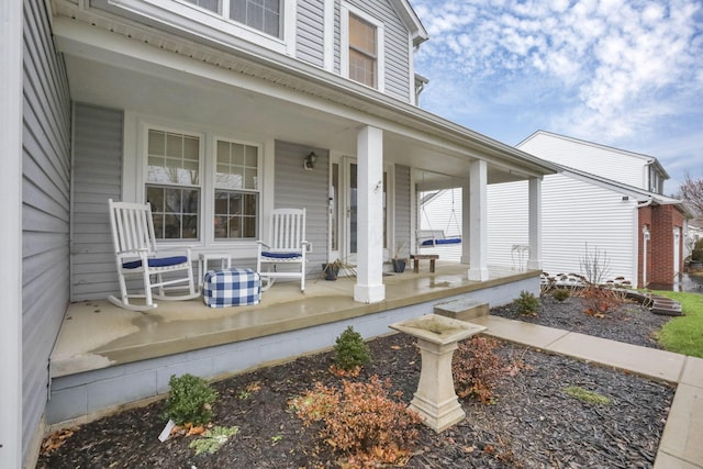 wooden terrace with covered porch