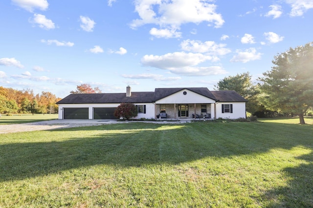 single story home with a front lawn and a garage