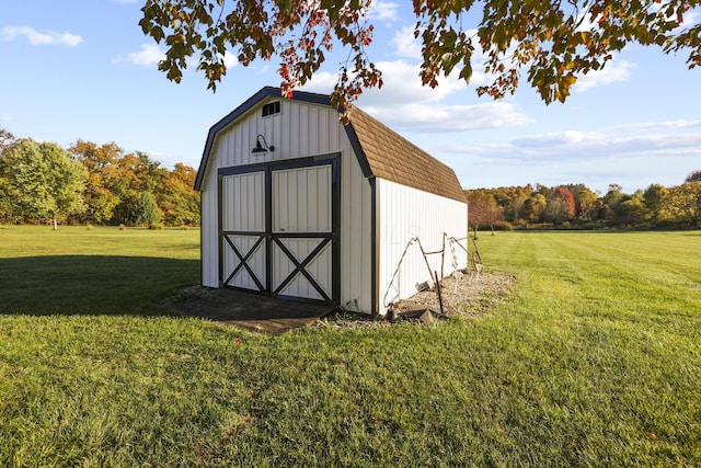 view of outdoor structure with a lawn