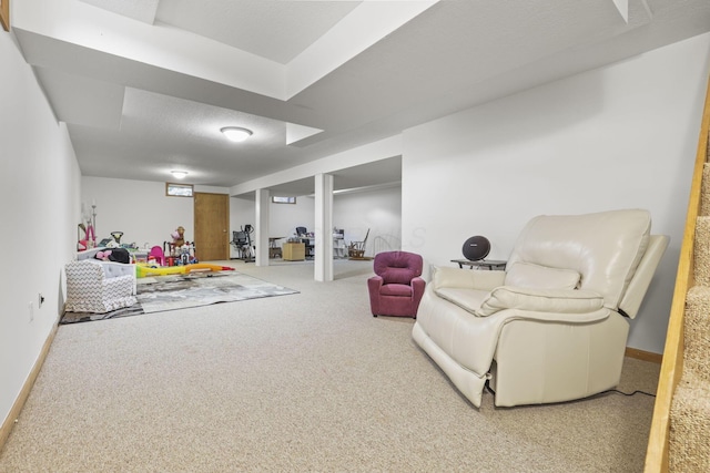 interior space with carpet flooring and a textured ceiling