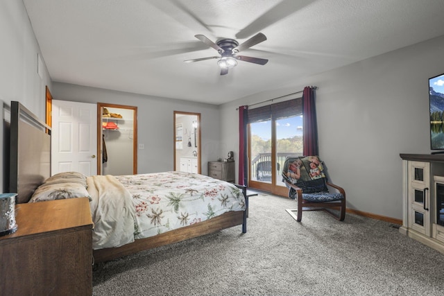 bedroom with carpet flooring, access to exterior, ceiling fan, a walk in closet, and a closet