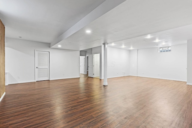 basement with dark wood-type flooring