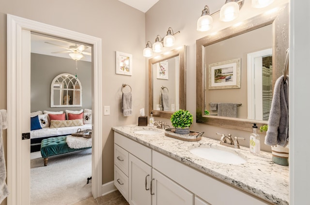 bathroom with ceiling fan and vanity