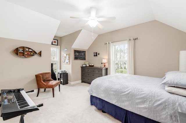 bedroom featuring ceiling fan, light colored carpet, and lofted ceiling