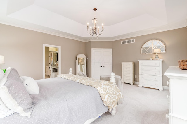 bedroom with an inviting chandelier, a raised ceiling, light colored carpet, a closet, and ornamental molding