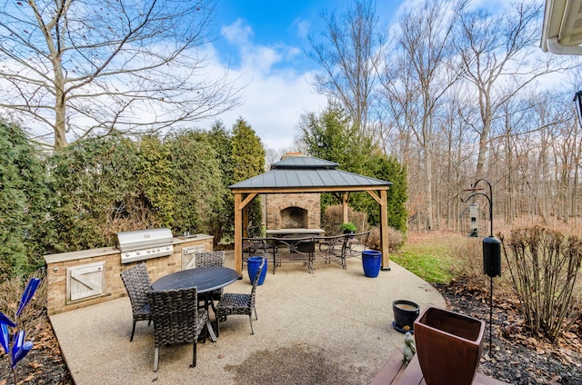 view of patio featuring a gazebo and area for grilling