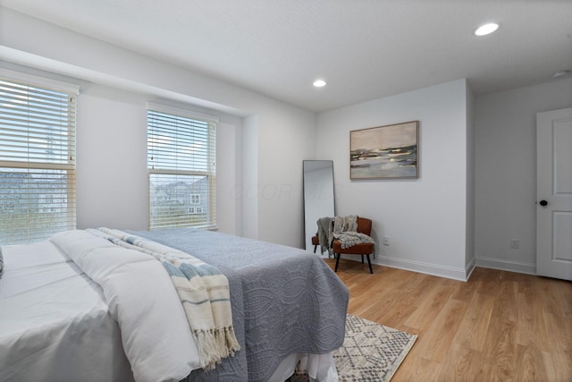 bedroom featuring light hardwood / wood-style floors