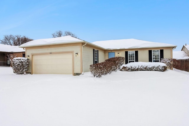 single story home with a garage