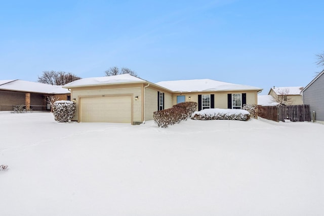 single story home with a garage