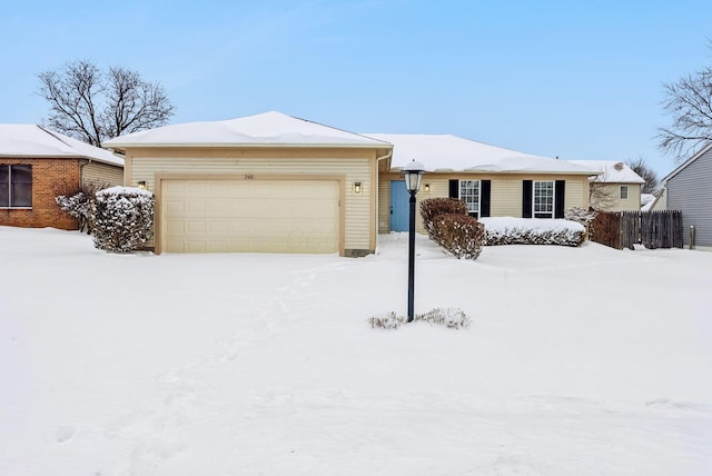 single story home with a garage