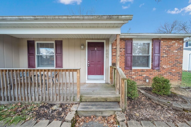 entrance to property with a porch