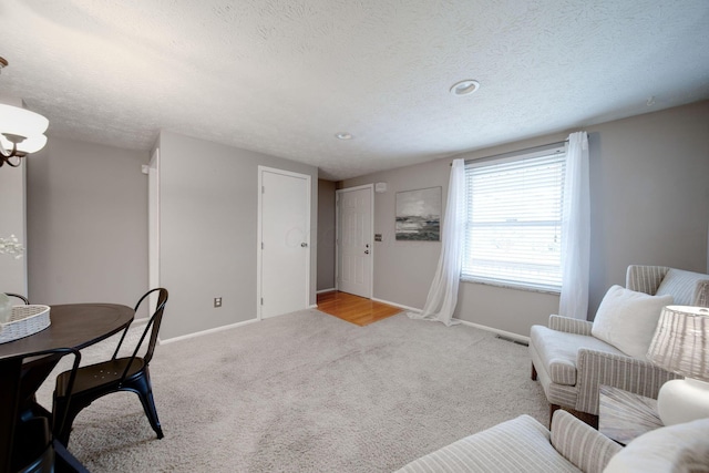 interior space featuring a textured ceiling