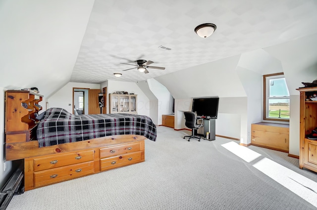 bedroom featuring ceiling fan, light carpet, and lofted ceiling