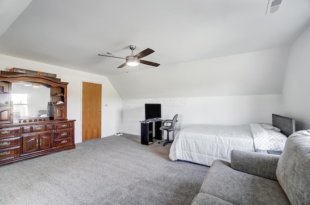 carpeted bedroom featuring ceiling fan and lofted ceiling