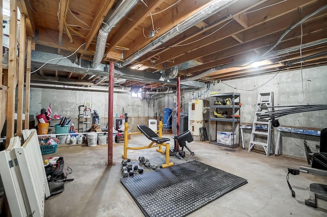 workout room featuring water heater