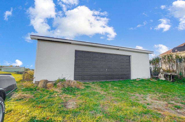 garage with a yard