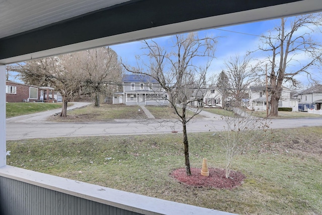 view of yard featuring a residential view