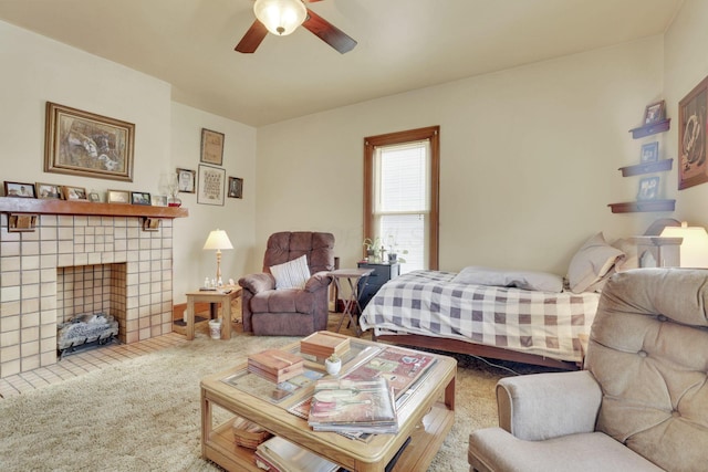 bedroom featuring carpet floors and a fireplace