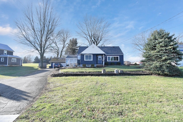 view of front of house with a front lawn