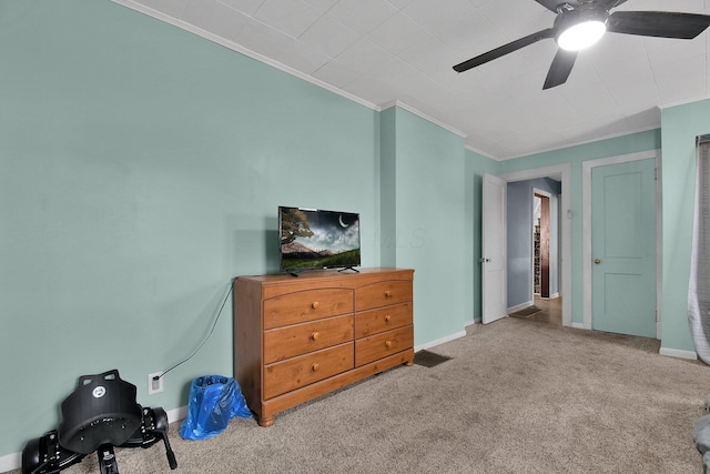 bedroom featuring carpet, ceiling fan, and ornamental molding