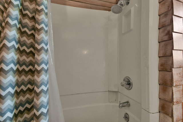 bathroom with shower / bath combo