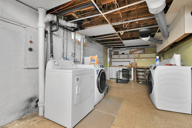 laundry room with washer and dryer