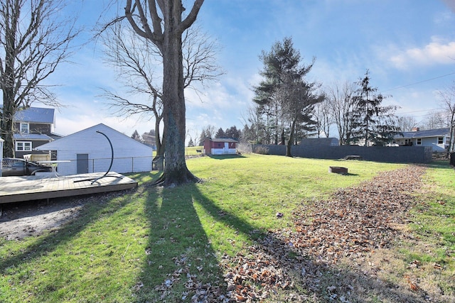 view of yard with a wooden deck