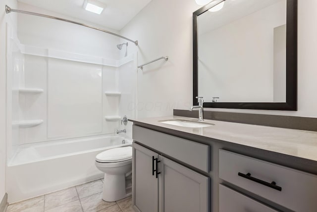 full bathroom with tile patterned flooring, toilet, vanity, and washtub / shower combination