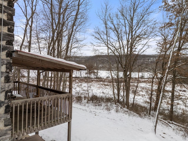 view of snow covered deck