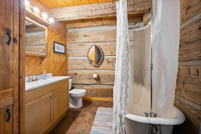 full bathroom featuring toilet, beamed ceiling, wooden walls, wood ceiling, and shower / tub combo with curtain