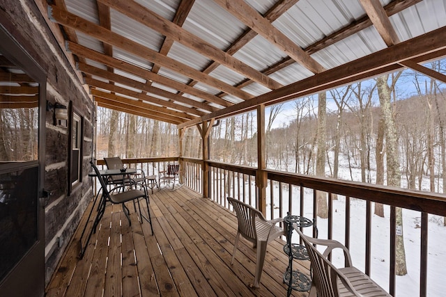 view of snow covered deck