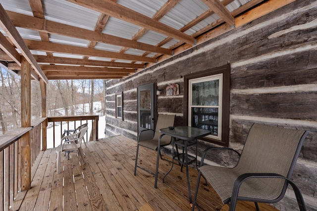 view of snow covered deck