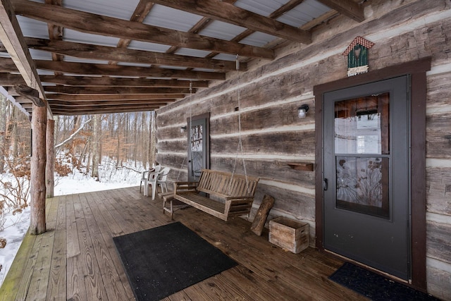 view of snow covered deck