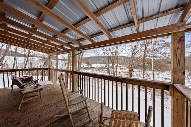 view of snow covered deck