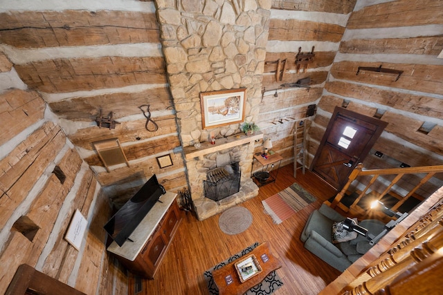 unfurnished living room featuring hardwood / wood-style flooring