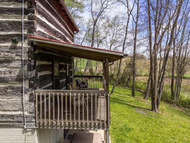 14635 Little Cola Rd, Rockbridge, OH 43149 - wooden terrace featuring a lawn