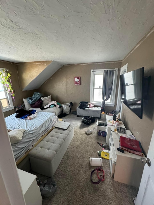 bedroom with carpet flooring, a textured ceiling, and vaulted ceiling