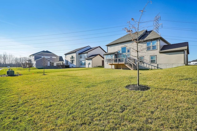 view of yard with a wooden deck