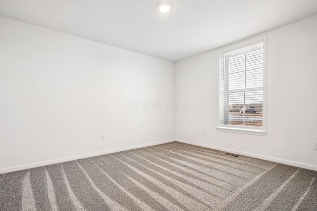 empty room featuring carpet