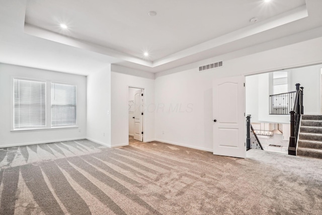 interior space featuring a tray ceiling