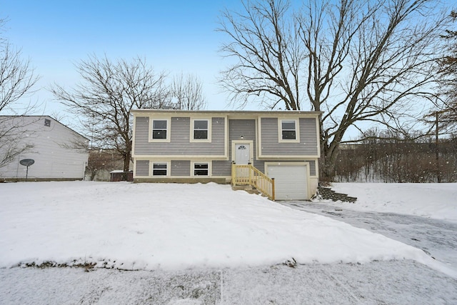 raised ranch featuring a garage