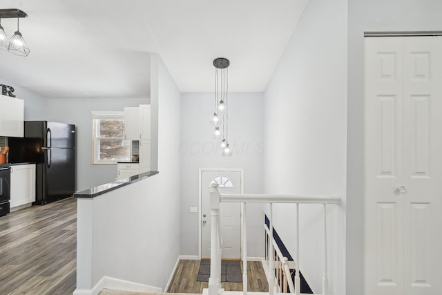 foyer with hardwood / wood-style floors