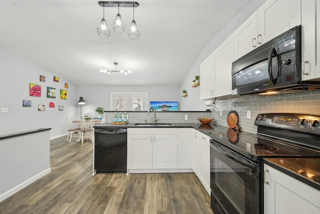 kitchen featuring pendant lighting, black appliances, dark hardwood / wood-style flooring, white cabinets, and sink