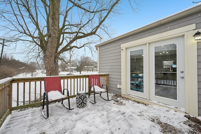 view of snow covered deck