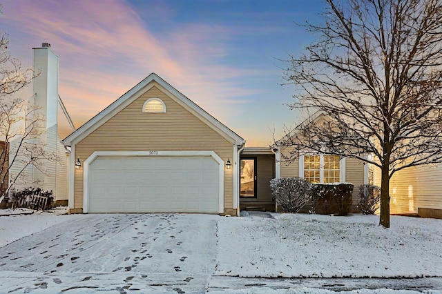 view of front of property featuring a garage